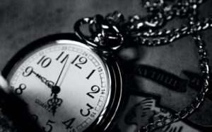 Time writer pocket watch on a chain