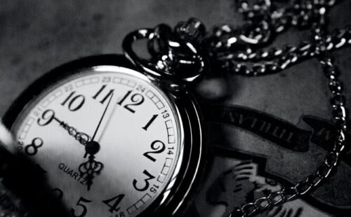 Time writer pocket watch on a chain